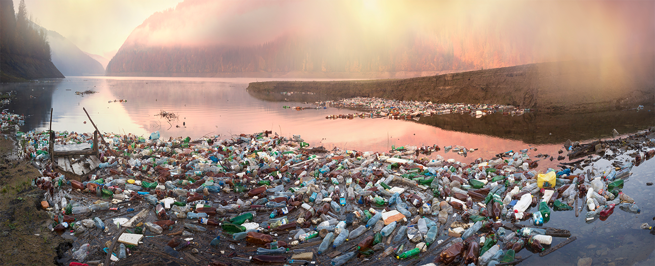 image of a coastline littered with rubbish and plastic bottles